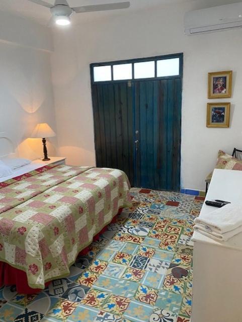 Chao Mama Hostal Santo Domingo Exterior photo
